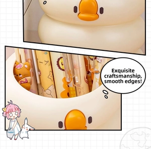 Detail of cute yellow duck pencil holder with smooth edges and multiple pen storage
