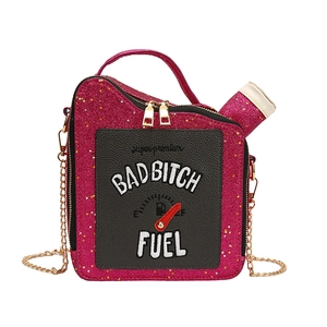 Detail of creative oil barrel handbag with BAD BITCH FUEL embroidery and chain strap