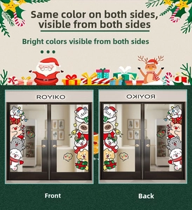 Close-up of double-sided Christmas static window stickers with Santa and reindeer