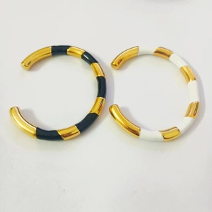 Retro 18k gold plated stainless steel open cuff bracelet with black and white enamel pattern