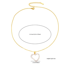 Detail of gold heart pendant with white zircons and S-STEEL engraved jewelry clasp