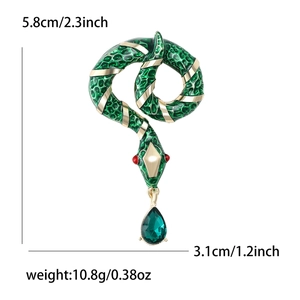 Green enamel snake brooch with gold stripes and teardrop gem, 2.3 inch height