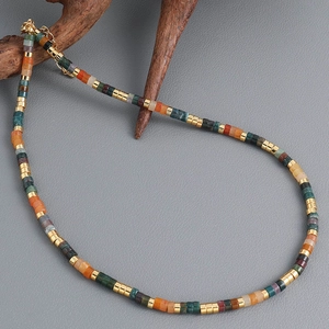 Bohemian style necklace with multi-color natural stone beads and golden metal spacers