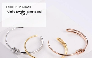 Close-up of knot design on minimalist steel bangles in gold, silver, and rose gold