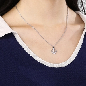 Silver titanium steel anchor pendant necklace for men and women worn on a model