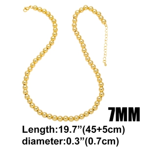 Detail view of 18k gold plated 7mm bead chain necklace with lobster clasp and sizing specs