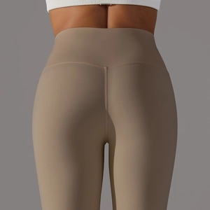Detail of high waist seamless yoga leggings in khaki with glute lifting seam design