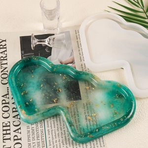 Irregular wave edge silicone mold with finished marble resin tray and gold foil details