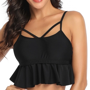 Women's black tankini top with cross straps and ruffle hem for swimwear