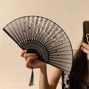 Classic Chinese folding fan with floral butterfly print and black hollowed bamboo ribs