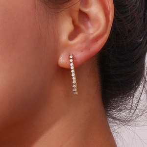 Exaggerated gold U-shape earrings featuring brilliant round-cut zircon stones for women