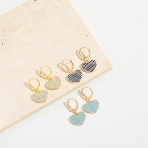 Elegant gold heart earrings with sparkling rhinestones in white, blue and turquoise
