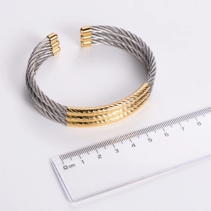 Three-layer steel wire cuff bracelet in silver and gold plating with measuring ruler