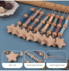 Detail of wooden star clip and food grade silicone beads for baby pacifier chain