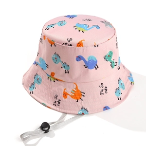 Detail of pink kids dinosaur sun hat with adjustable drawstring and cute cartoon print