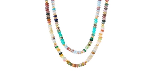 Close-up of double-layered beaded necklace with colorful stones and gold spacer beads