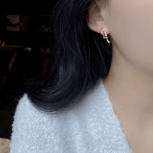 Asymmetric liquid metal gold earrings for women with irregular geometric design style