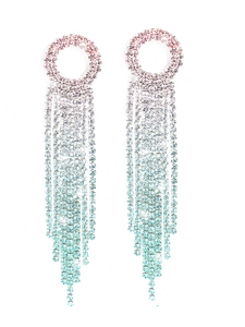 Detail of long tassel rhinestone earrings with pink, white, and blue gradient drop