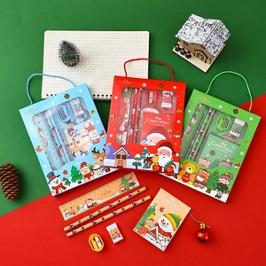 Detailed view of Christmas stationery gift set with festive holiday items