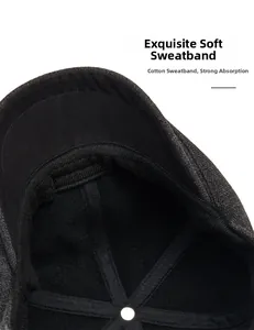 Detail view of cotton sweatband on gray wool newsboy cap with neat stitching