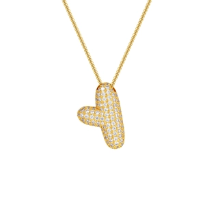 Macro shot of 18K gold plated letter T pendant with sparkling zircon micro-paving detail