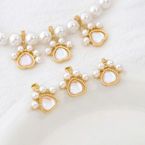 Gold-plated cat paw pendant with white pearl and iridescent heart for DIY jewelry making