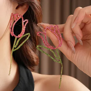 Pink rhinestone tulip tassel earrings with gold base and long fringe drop for women