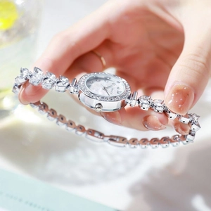 Elegant silver mermaid watch for women with rhinestone-encrusted bezel and chain strap