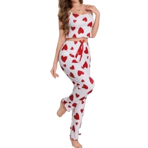 Women's two-piece pajama set featuring heart print ribbed camisole and long pants