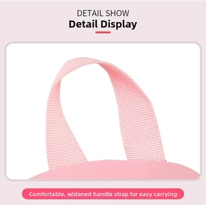 Close-up of the wide pink woven handle on a girl's ballet backpack for comfortable carrying