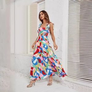 Sexy abstract print tiered maxi dress with spaghetti straps and a cinched waist