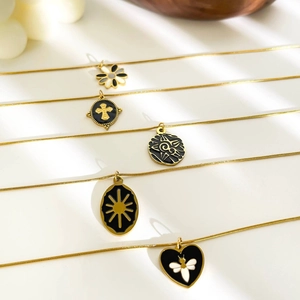 Golden titanium steel necklaces with enamel flower heart and sunburst charms set