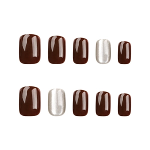 Short square press-on nails in deep chocolate brown and silver cat-eye glitter finish