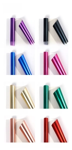 Macro detail of eight-color aluminized gift wrapping paper rolls with metallic texture