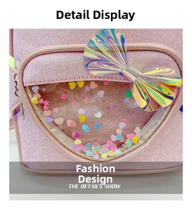 Detail of pink glitter backpack featuring a laser bow and heart-shaped sequin pocket