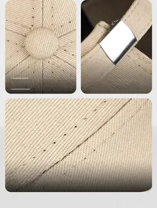 Détail du bonnet docker kaki montrant le bouton, la boucle en métal et les coutures