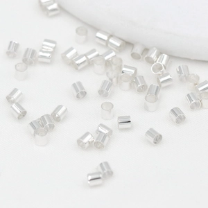 Close-up of polished silver metal spacer beads for DIY bracelet and jewelry making