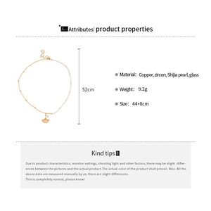 Detail of half-chain half-pearl necklace with gold maple leaf and zircon accents