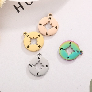 Polished stainless steel compass pendants with star cutout in four metallic colors