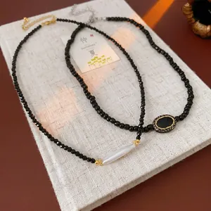French vintage style freshwater pearl necklace with black crystals and gold accents