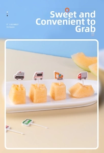 Creative vehicle-shaped fruit picks used on fresh melon pieces for kids' bento decoration