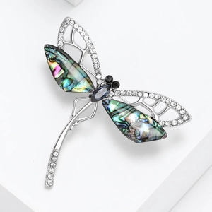 Elegant silver dragonfly brooch with natural abalone shell wings and sparkling crystals