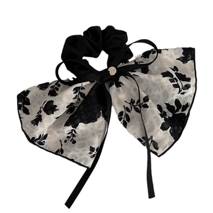 Elegant black and white floral chiffon bow scrunchie with silver button and long ribbons
