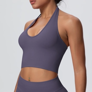 Detail of purple halter neck sports bra with high-stretch seamless ribbed texture