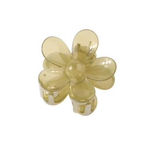 Detailed view of yellow jelly translucent flower hair claw clip with metal spring
