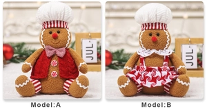 Detail of plush gingerbread man figurines with red knit vest and lace dress outfits