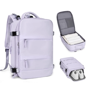 Detail of lavender travel backpack featuring an independent shoe compartment and 180-degree opening
