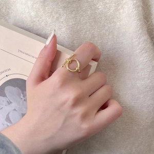 Elegant 925 sterling silver geometric knot OT toggle ring with a gold finish for women