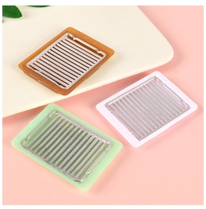 Miniature dollhouse grill pans in brown, white, and green for DIY kitchen scenes