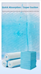 Detail showing rapid liquid absorption on multi-layer thickened blue pet training pee pads